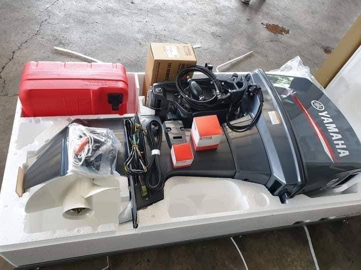 Yamaha 85 outboard motor in shipping crate, side view
