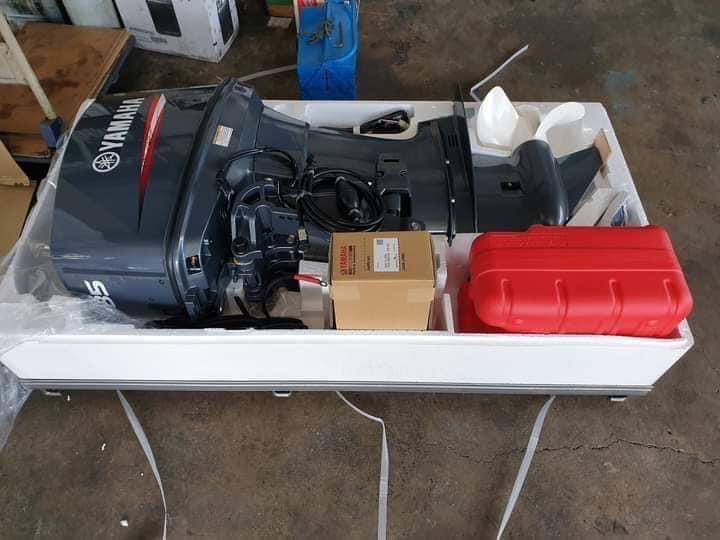Yamaha 85 outboard motor in shipping crate from above