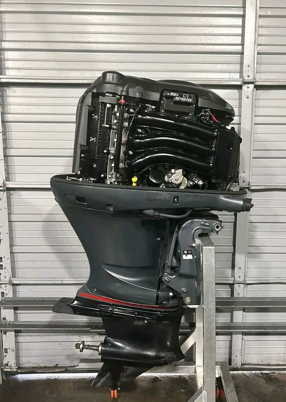2021 Yamaha VF250 VMAX SHO 250HP outboard motor — powerhead with cowling removed, compression readings marked 205 PSI